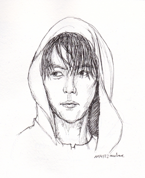 Xiao Yuliang as Zhang Qiling in his hoodie, looking beyond the viewer